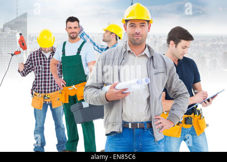 Composite image of architect looking at camera Stock Photo