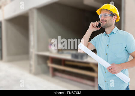 Composite image of male architect with blueprint talking on mobile phone Stock Photo