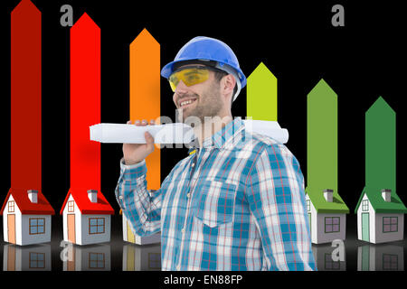 Composite image of smiling architect looking away while holding blueprint Stock Photo