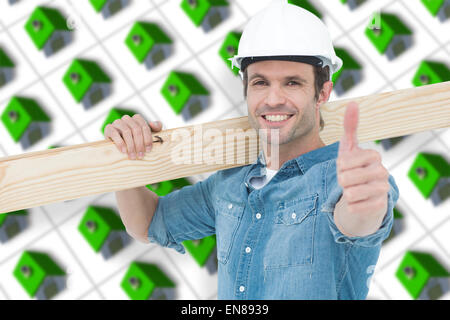 Composite image of confident carpenter carrying wooden plank Stock Photo