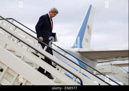 U.S. Secretary of State John Kerry steps off his airplane at Heathrow Airport in London, U.K., on March 21, 2015, for a meeting en route to Washington with allies from England, Germany, France, and the European Union about ongoing negotiations with Iran over the future of its nuclear program. Stock Photo