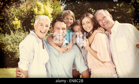 Smiling family and grandparents in the countryside Stock Photo