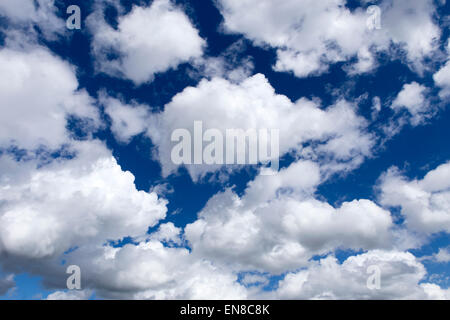 white clouds in a deep blue sky Stock Photo