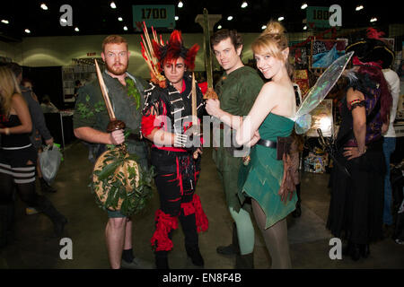 Cosplayers dressed as Peter Pan, Rufio and Tinkerbell from the movie Hook at Stan Lee's Comikaze comic convention in Los Angeles Stock Photo