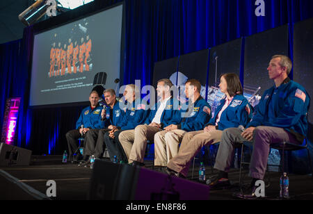 The crew of STS-125, the final Hubble Servicing Mission, participate in a panel discussion as part of an event celebrating the 25th Anniversary of the Hubble Space Telescope, Saturday, April 25, 2015 at the Smithsonian's Steven F. Udvar-Hazy Center in Chantilly, Va.  From left: former NASA astronauts John Grunsfeld, Michael T. Good, Mike Massimino, Scott Altman, Gregory C. Johnson, and current NASA astronauts Megan McArthur Behnken and Andrew Feustel. Stock Photo