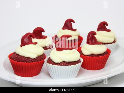 Selection of red velvet cupcakes with cream cheese frosting Stock Photo