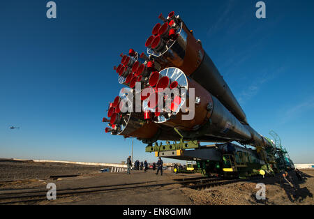 The Soyuz TMA-16M spacecraft is rolled out by train to the launch pad at the Baikonur Cosmodrome, Kazakhstan, Wednesday, March 25, 2015. NASA Astronaut Scott Kelly, and Russian Cosmonauts Mikhail Kornienko, and Gennady Padalka of the Russian Federal Space Agency (Roscosmos) are scheduled to launch to the International Space Station in the Soyuz TMA-16M spacecraft from the Baikonur Cosmodrome in Kazakhstan March 28, Kazakh time (March 27 Eastern time.) As the one-year crew, Kelly and Kornienko will return to Earth on Soyuz TMA-18M in March 2016.  Photo Credit (NASA/Bill Ingalls) Stock Photo