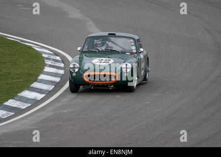 Ian Burford 1959 Sebring Sprite cornering hard at Woodcote during the Les Leston Cup race at the Goodwood 73rd Members Meeting Stock Photo