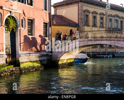 Visitors & locals enjoy Venice, Italy, the City of Canals Stock Photo