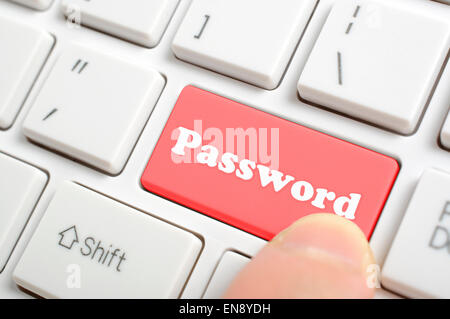 Pressing red password key on keyboard Stock Photo