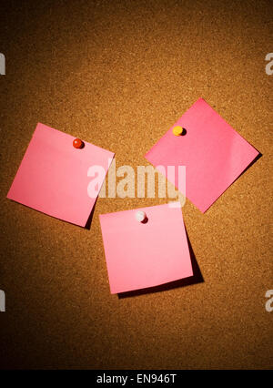 Blank pink papers on a cardboard Stock Photo
