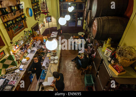 Typical old Spanish bodega bar with wooden barrels in Barrio Gotico or Barri Gotic district, Barcelona, Catalonia, Spain Stock Photo