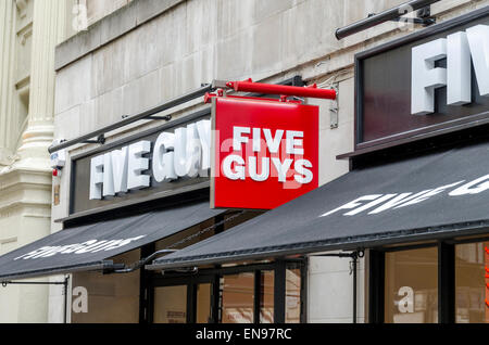 Five Guys restaurant fast casual restaurant founded by Janie & Jerry Murrell. Argyll Street, London Stock Photo