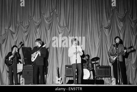 The Rolling Stones performing at The ABC Theatre, Belfast. Left to right: Bill Wyman, Brian Jones, Mick Jagger, Charlie Watts and Keith Richards. 6th January 1965. Stock Photo
