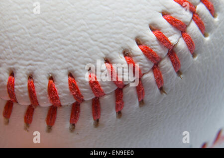 Close up view of red baseball stitches Stock Photo