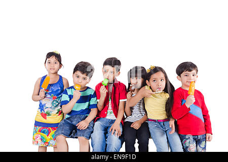 indian kids group friends Eating Ice Cream Stock Photo