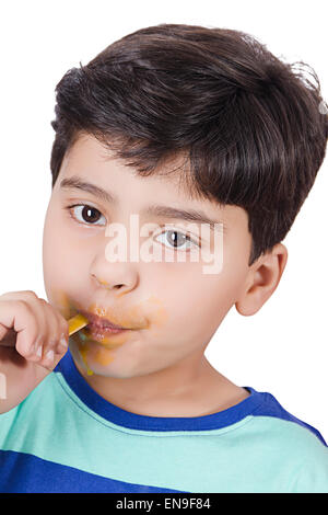 1 indian kids boy Eating Ice Cream Stock Photo