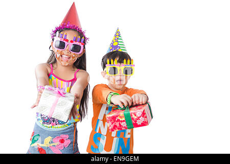 2 indian kids friends Birthday Gift Stock Photo