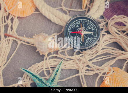 compass on fishing net with tag Stock Photo