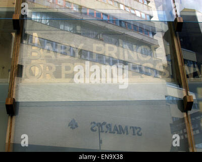 London, UK. 30th Apr, 2015. The lettering of St. Mary's Hospital is reflected by an opposing window that reads 'Baby Prince or Princess' in wooden letters in London, England, 30 April 2015. Duchess Kate will give birth to her second baby in the hospital. Photo: BRITTA SCHULTEJANS/dpa/Alamy Live News Stock Photo