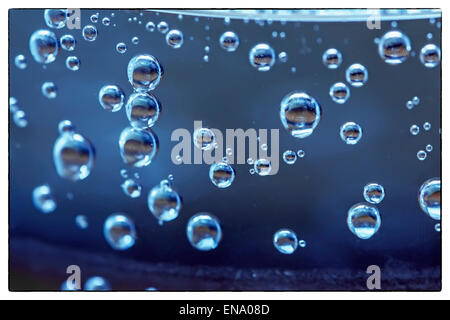 Cute bubbles in water on dark background Stock Photo