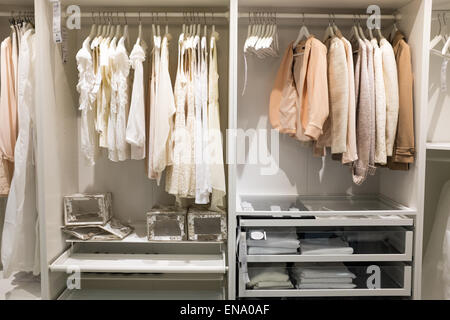 Boy clothes on hangers in the wardrobe Stock Photo - Alamy