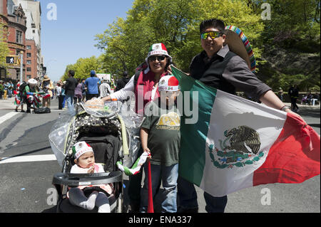 Mexican family at Cinco de Mayo parade on Central Park West in NYC. Stock Photo