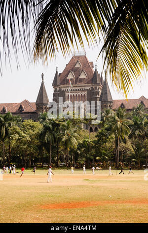 View of the High Court from across the Oval Maidan cricket grounds, Mumbai. Stock Photo