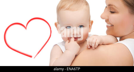 Happy valentines day. Adorable baby sitting and smiling among red heart ...