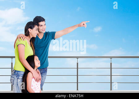 indian Parents and daughter Railing Showing Stock Photo