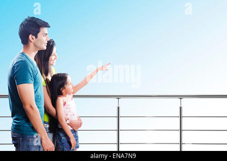 indian Parents and daughter Railing showing Stock Photo