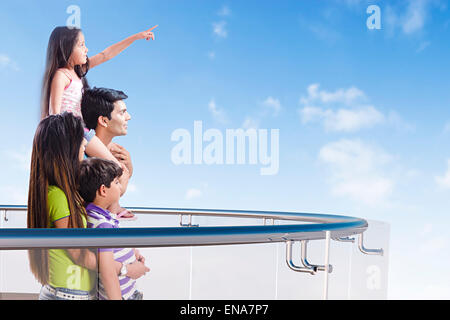 indian Parents and kids Railing showing Stock Photo