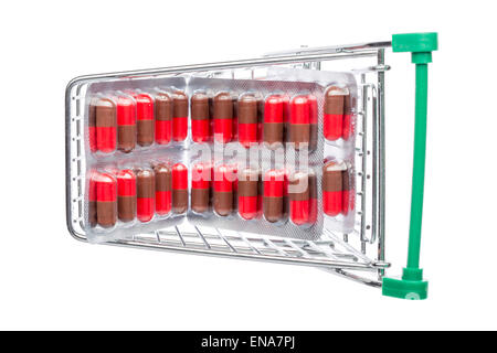 Shop cart with red-brown pills blisters on an white background Stock Photo