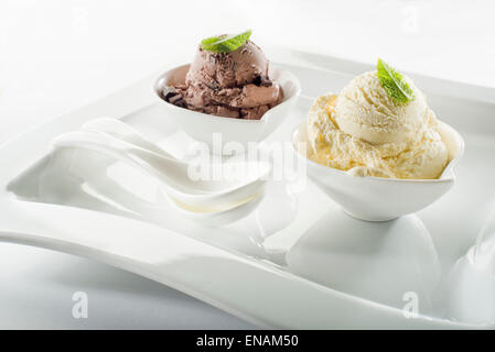 Ice cream in bowl on white background Stock Photo