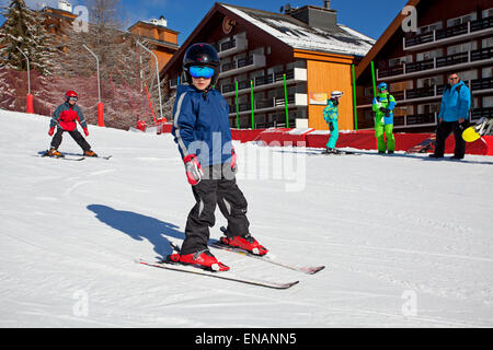 Young boy learning to ski Stock Photo