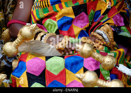 Gold rings decorate the hands of Otumfuo Nana Osei Tutu II the 16th King Asantehene traditional ruler of the Kingdom of Ashanti or Asante which was an Akan empire and kingdom from 1701 to 1957, in what is now modern-day Ghana West Africa. Today, the Ashanti Kingdom survives as a constitutionally protected, sub-national traditional state in union with the Republic of Ghana Stock Photo