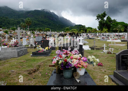 The Bel Air Cemetery oldest historic site on the western outskirts of Victoria in Mahe Island in the Republic of Seychelles. The cemetery was the first official burial ground to be opened on Mahe soon after the establishment of the French settlement in the late 18th century and contain the remains of some of the islands most famous personalities. Stock Photo