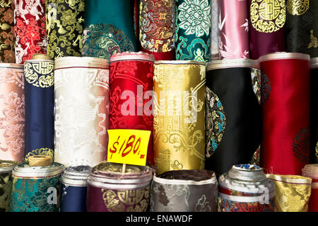 dh Western Market shop SHEUNG WAN HONG KONG Patterns Rolls of silk fabric cloth price tag goods china traditional chinese pattern close up Stock Photo