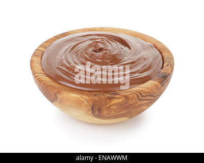 chocolate hazelnut cream in wood bowl, isolated Stock Photo