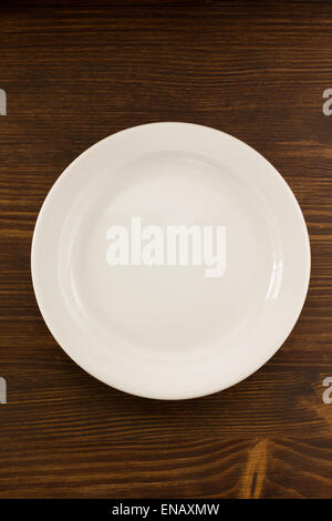 empty plate on wooden background Stock Photo