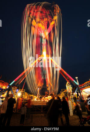 All the fun of the fair with Fair Ground Images making Patterns in lights at Night Stock Photo