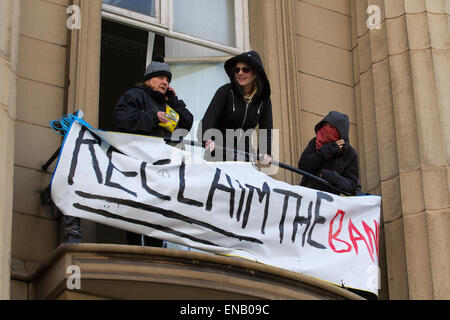 Liverpool, Merseyside, 1st May, 2015. Homeless Demonstrators or Love Activists occupying Liverpool bank building in Castle Street vow to lock themselves in the vault if bailiffs try to evict them. In new tactics today Merseyside Police issue Dispersion Orders to sympathisers providing food and water to the occupiers of the old Bank. Love Activists are resisting a planned eviction from a historic former Liverpool city centre building which they turned into an illegal homeless shelter.  Credit:  Mar Photographics/Alamy Live News Stock Photo