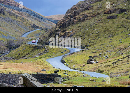 Car on Honister Pass (B5289), Lake District National Park, Cumbria, England UK Stock Photo