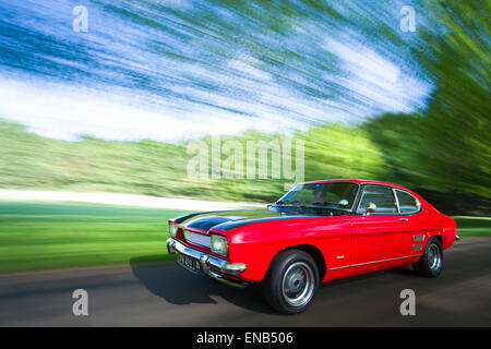 Ford Capri MKI in red with a Burton Engine in motion panning rig shot. Stock Photo