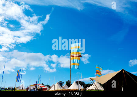 The boutique camping area at Festival No.6, Portmeirion, Wales, UK and people wake boarding Stock Photo