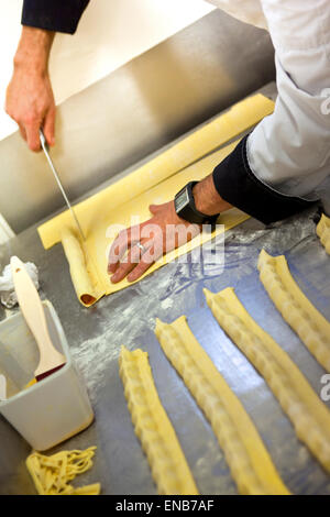 Chef making cakes in a French bakery Stock Photo