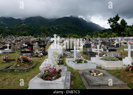 The Bel Air Cemetery oldest historic site on the western outskirts of Victoria in Mahe Island in the Republic of Seychelles. The cemetery was the first official burial ground to be opened on Mahe soon after the establishment of the French settlement in the late 18th century and contain the remains of some of the islands most famous personalities. Stock Photo