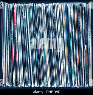 Stack of old vinyl records. blue tone Stock Photo