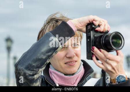 Portrait of a female photographer Stock Photo