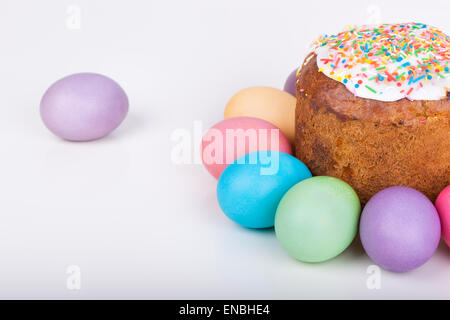 Easter cake and painted eggs closeup on white background Stock Photo